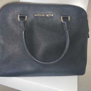 Black Michael Kors bag.